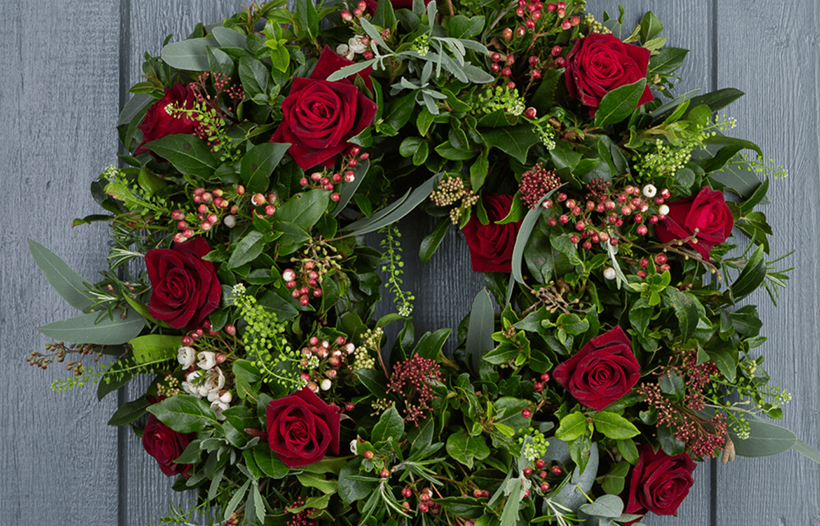 Christmas wreath hanging on door