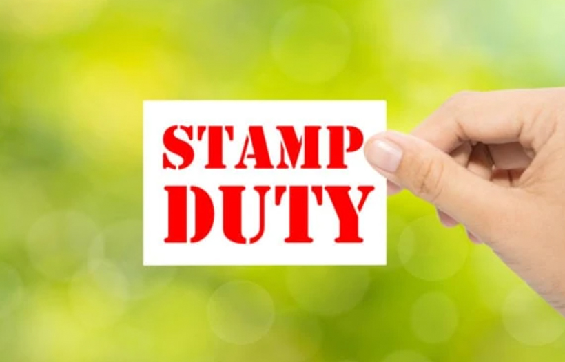 Person holiding a Stamp Duty card