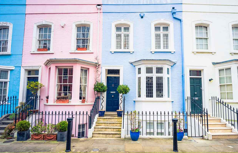 Row of multi-coloured terraced houses
