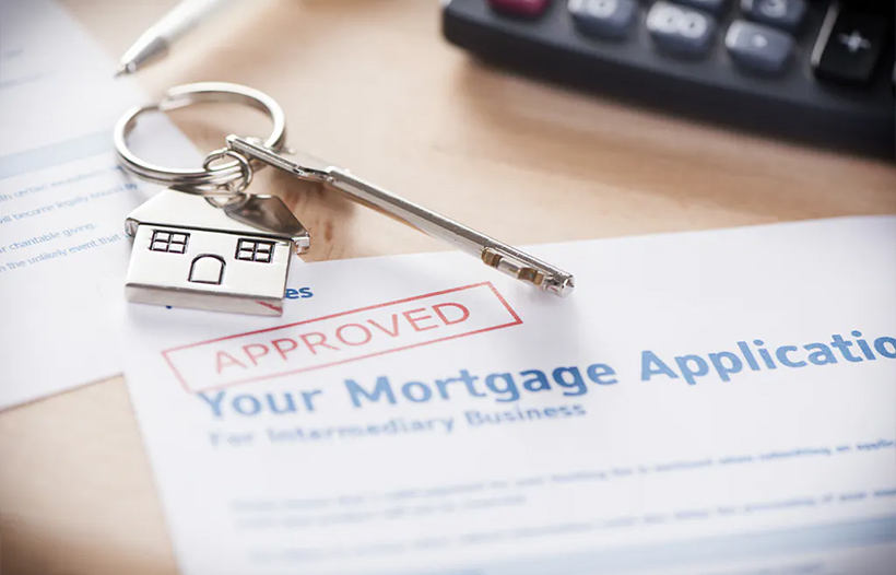 Set of keys above mortgage application form