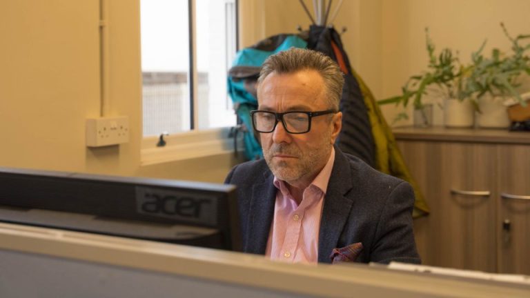 Kevin at Desk - Pocock + Shaw