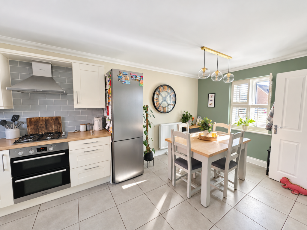 Soft daylight brightens the kitchen